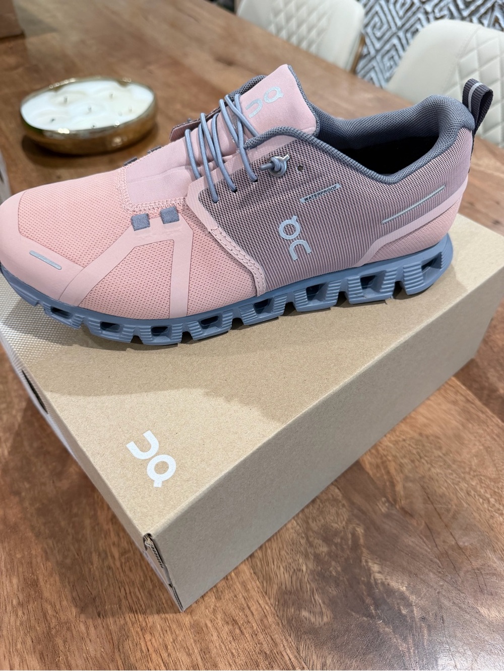 On Running Women’s Pink and Gray Cloud Sneaker